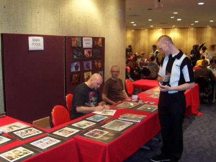 Right Said Fred sign autographs for a loyal fan